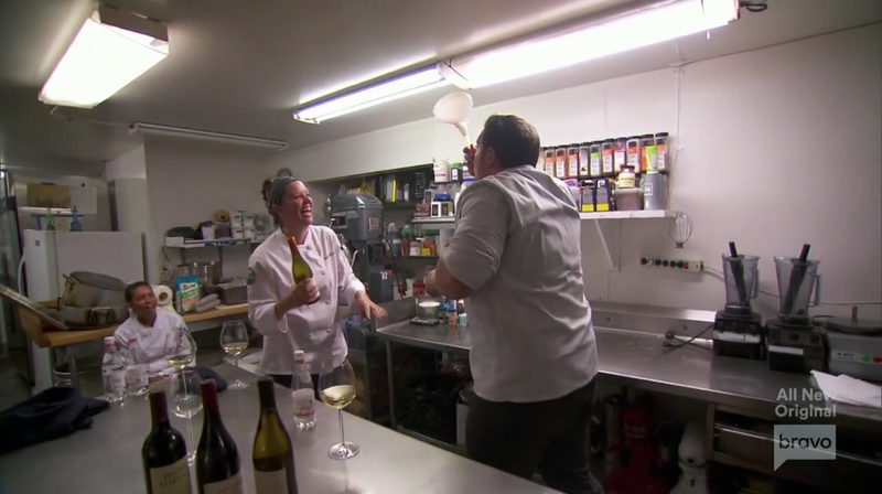 Wine-bonging. (Screenshot: Bravo)